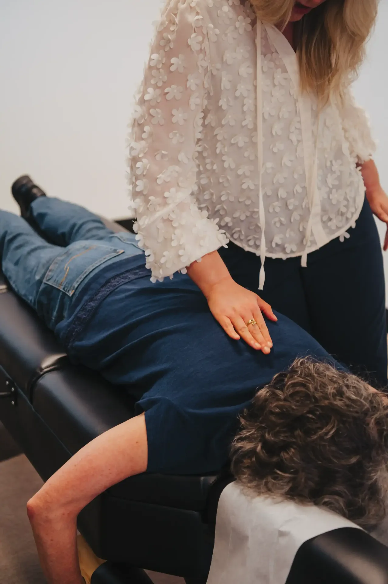 Dr. Mariah performing a gentle low back adjustment